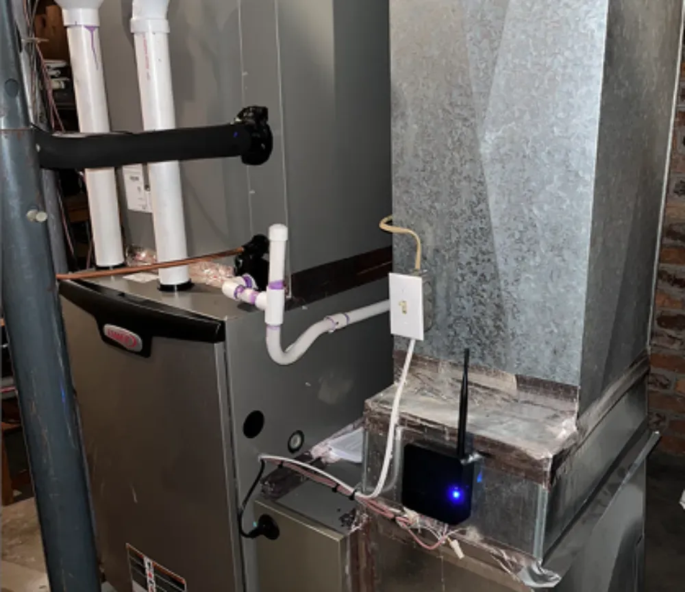 PVC drain lines and a Wi-Fi module at a Fountain Inn furnace