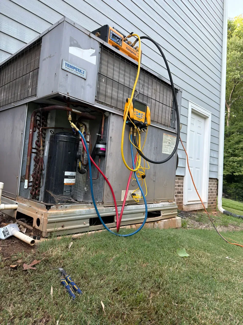 Refrigerant gauges connected to a Tempstar package unit in Fountain Inn