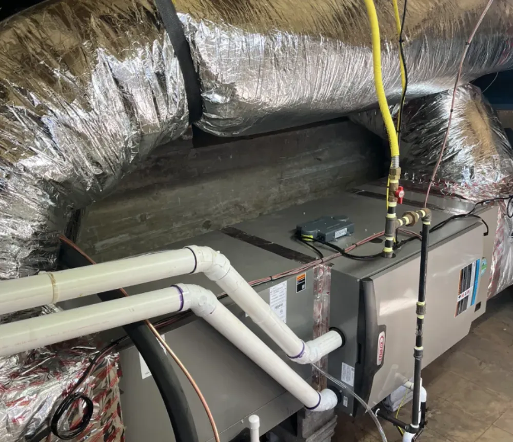 Insulated flexible ductwork connected to an air handler plenum in a Simpsonville home