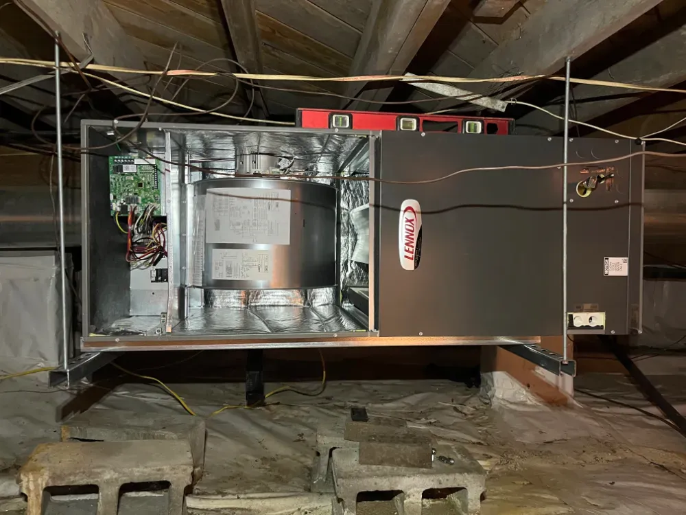 The control board of a Lennox air handler in a Woodruff home