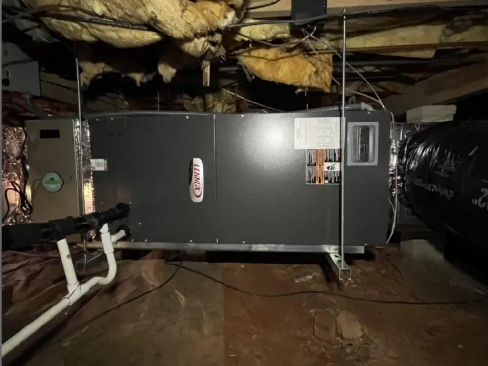 A Lennox air handler installed in a Duncan crawl space